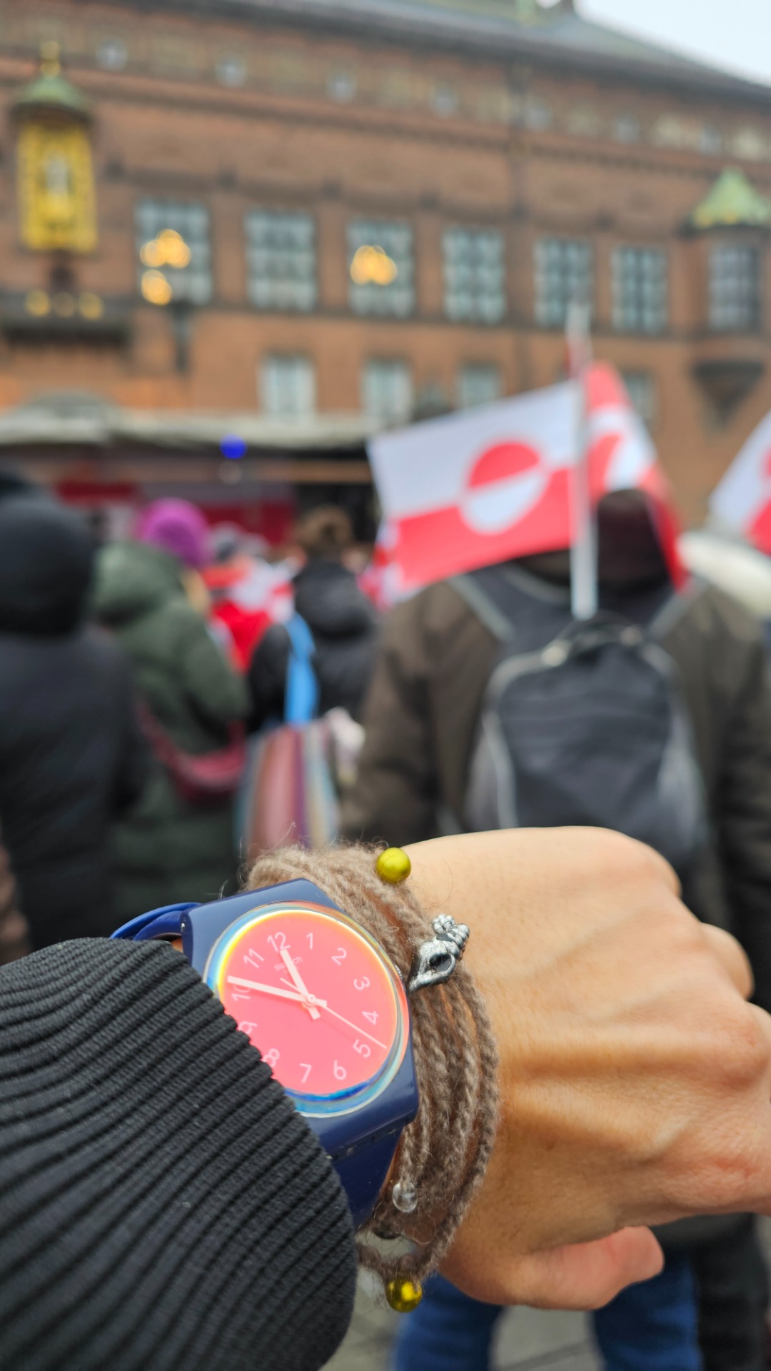 January 2026. Showing my support for Kalaallit Nunaat with my presence on the ground. I’m wearing the only thing I have from there: a bracelet made of muskox wool, bought at the Greenlandic House in Copenhagen.